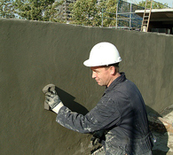 Sponge Finishing of a Surface Levelling Mortar Following Concrete Repair Works NCC